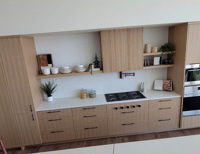 Contemporary kitchen cabinetry with integrated appliances